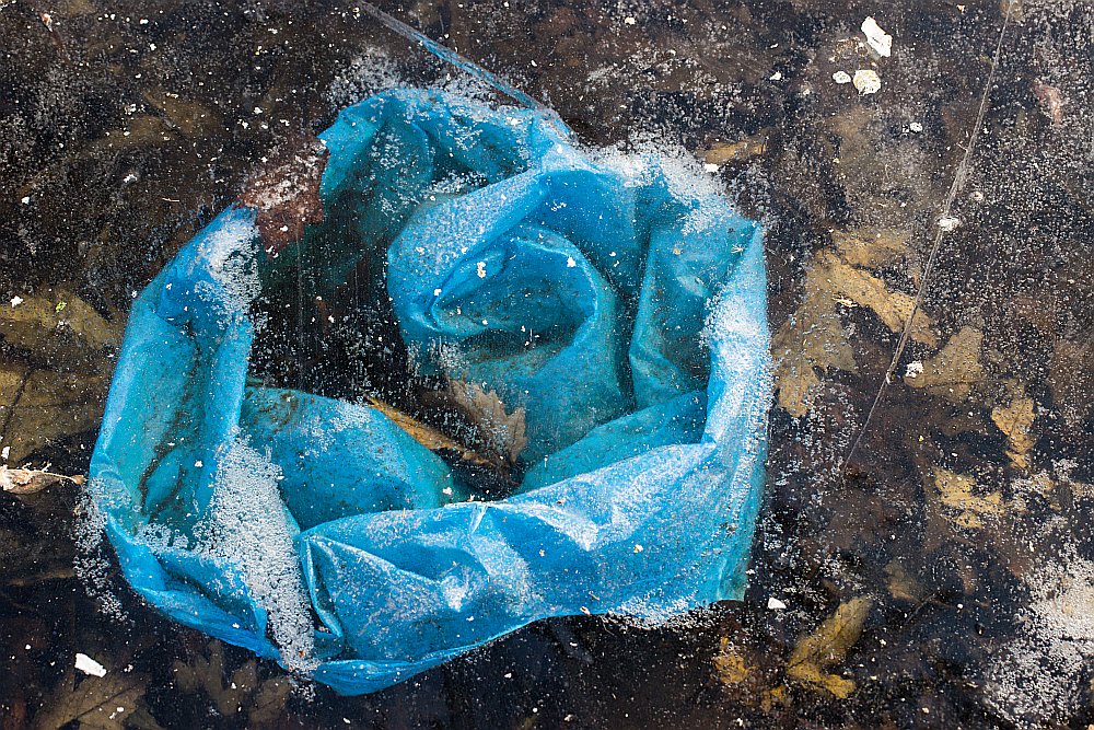 frozen ice blue plastic bag